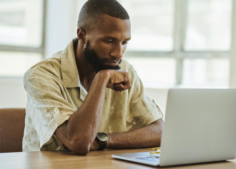 Person taking assessment on laptop