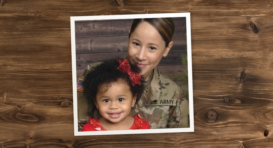 Photo of Lihán Harris and daughter on a woodgrain background