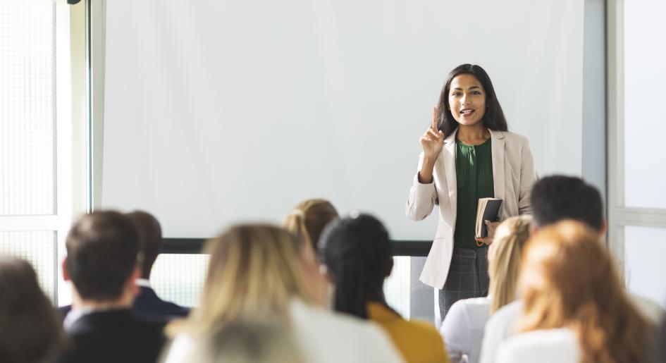 Law students in classroom listening to professor