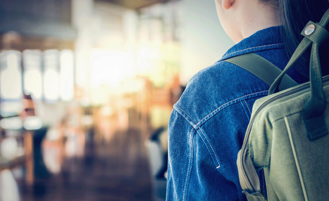 Student carrying backpack